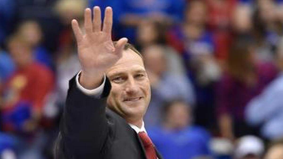 
David Beaty was introduced as the new Kansas football coach at halftime of the Jayhawks basketball game against Florida.
