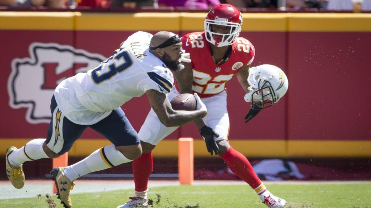 Chargers wide receiver Keenan Allen lost his helmet with Chiefs cornerback Marcus Peters in coverage Sunday at Arrowhead.
