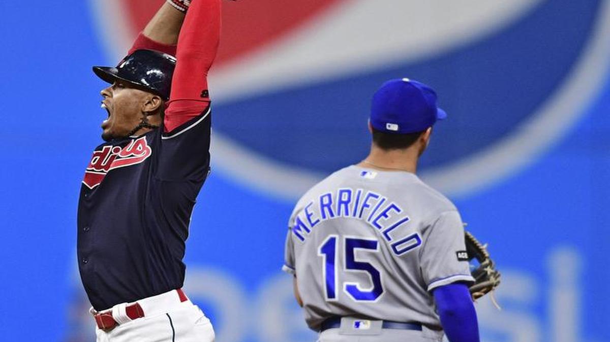 Whit Merrifield (right) and the Royals could not close out the Cleveland Indians on Thursday night. It was the Indians’ 22nd straight win, and another tough loss for the Royals, whose playoff hopes are fading.