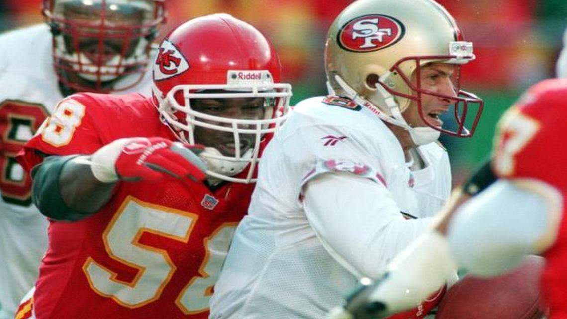 
Even 49ers’ quarterback Steve Young had trouble getting away from the Chiefs’ Derrick Thomas, a fellow Hall of Famer. 
