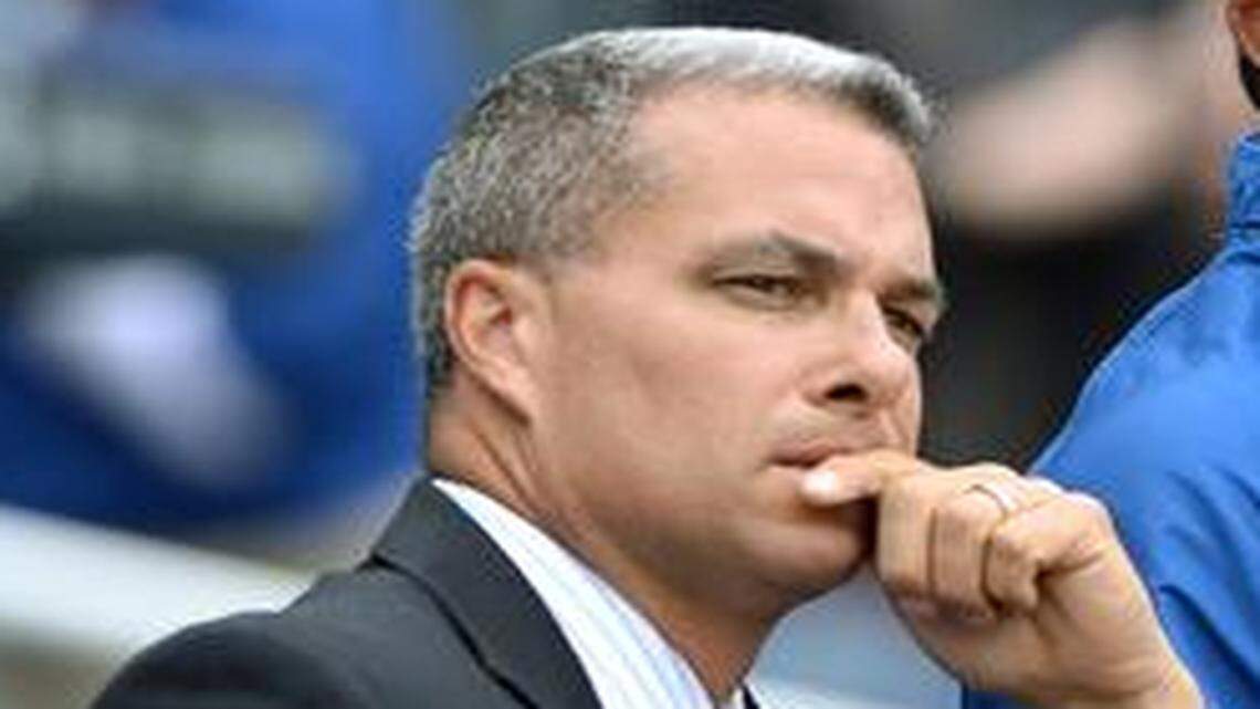 
General manager Dayton Moore (left) and manager Ned Yost 

