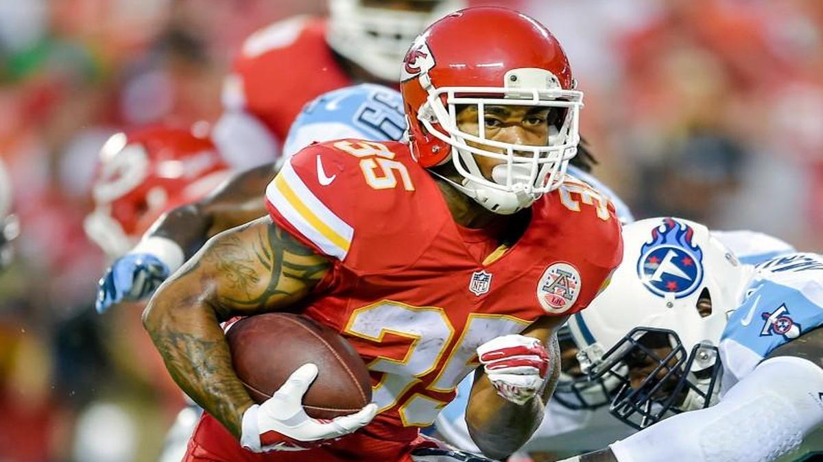 
Chiefs running back Charcandrick West (front) scored a two-point conversion during the first half Friday.
