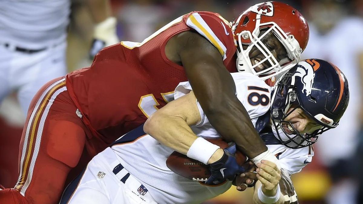 Chiefs outside linebacker Justin Houston (50) sacked Broncos quarterback Peyton Manning during their Sep. 17 football game at Arrowhead Stadium.