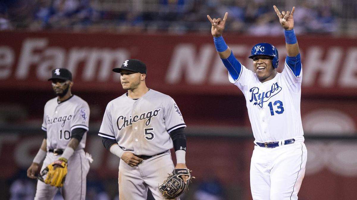 
Salvador Perez sent some celebratory hand signals back to the Royals dugout after stealing second base against the White Sox earlier this month.
