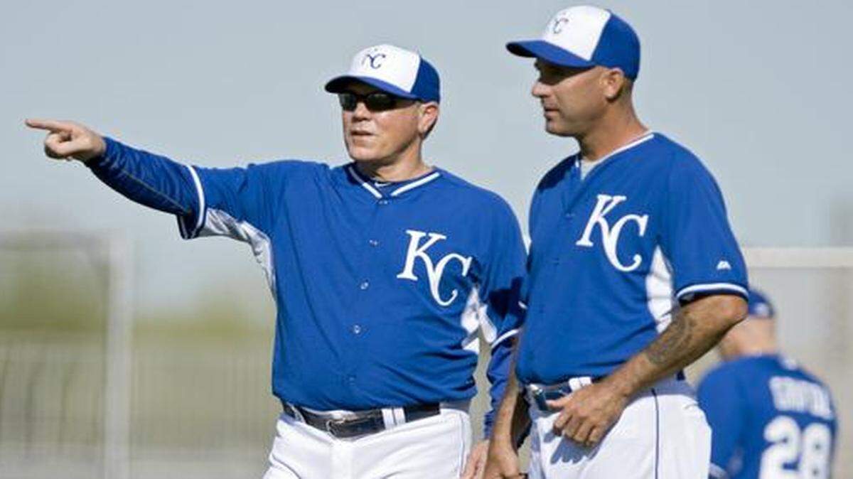 
Royals manager Ned Yost talked with Dale Sveum during spring training. Sveum was recently moved from third base coach to hitting coach.
