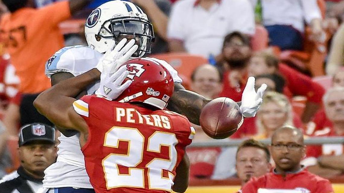 
Chiefs cornerback Marcus Peters broke up a pass intended for Titans tight end Delanie Walker during a preseason game Aug. 28.
