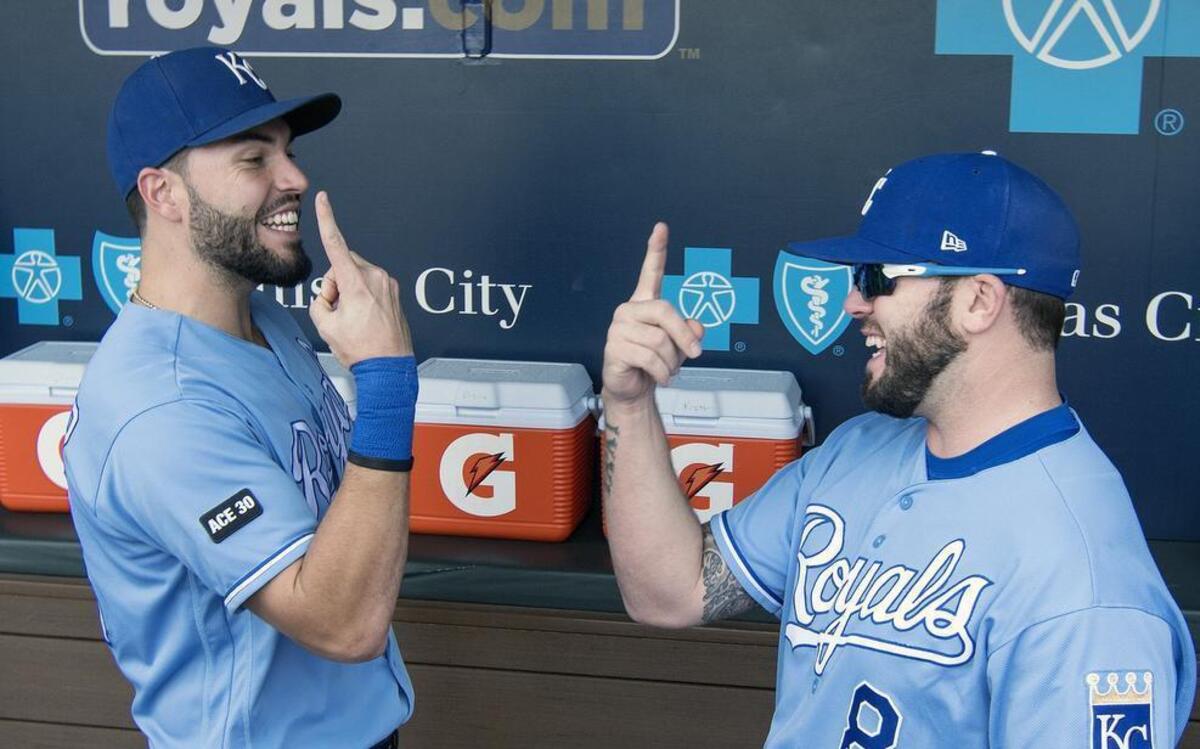 The Royals’ Mike Moustakas (right) and Eric Hosmer performed their pregame ritual one last time before Sunday’s game against the Diamondbacks at Kauffman Stadium.