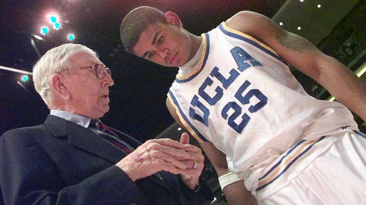 Even after he retired as UCLA coach, John Wooden (left) was a resource to Bruins players like Earl Watson, who would spend hours with the Hall of Famer listening to guidance about life beyond basketball.
