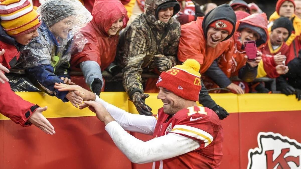 Kansas City Chiefs quarterback Alex Smith celebrated a 30-22 win over the Buffalo Bills with fans on Nov. 29 at Arrowhead Stadium.