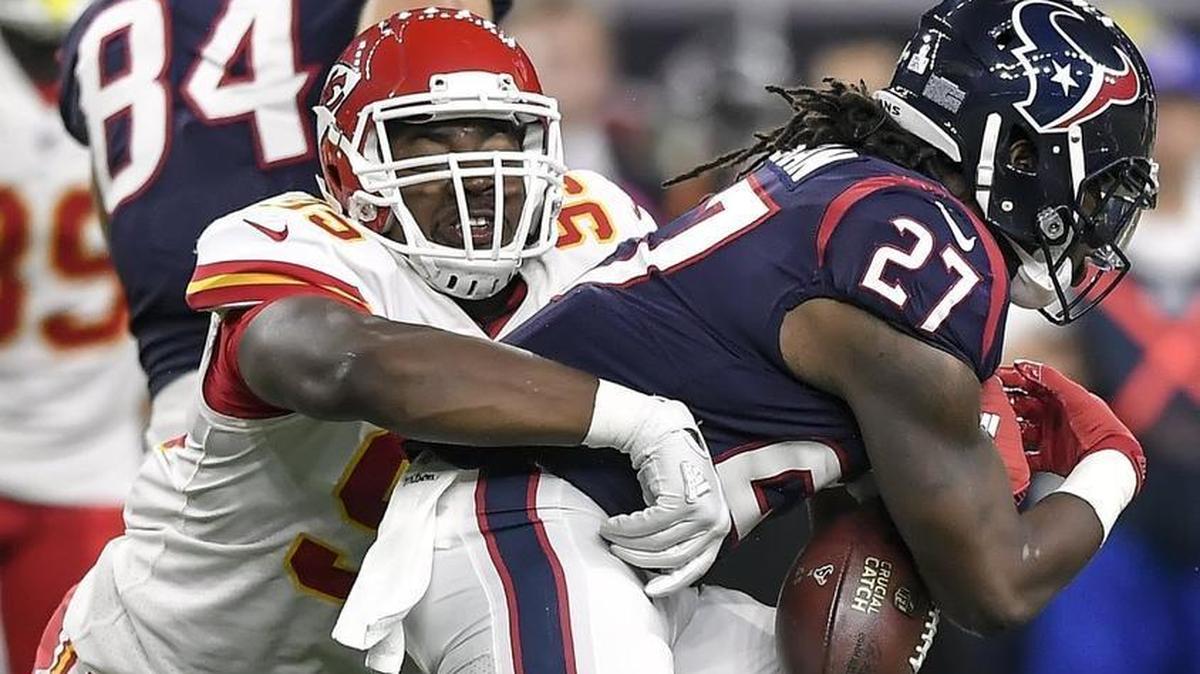 Chris Jones jarred loose the football from Texans running back D’Onta Foreman during Sunday night’s game in Houston.
