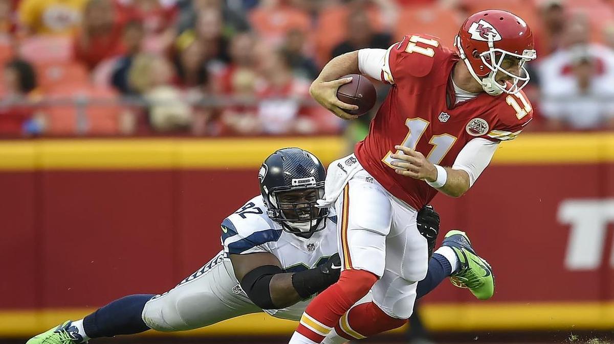 
Chiefs quarterback Alex Smith couldn’t escape a sack after he was pressured by Seahawks defensive tackle Brandon Mebane on Friday.
