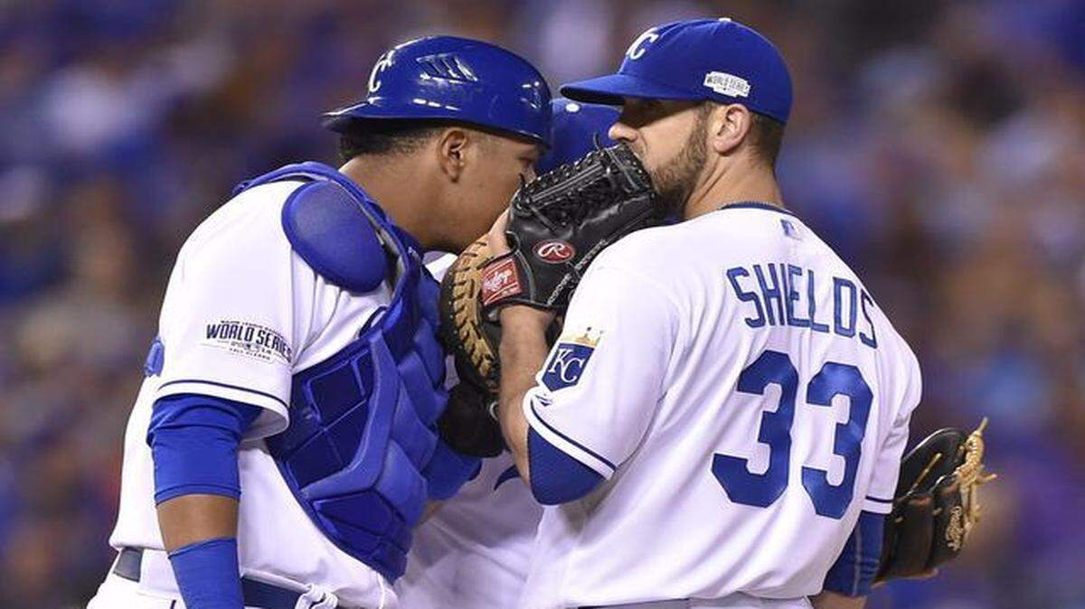 
Royals starting pitcher James Shields and catcher Salvador Perez talk on the mound during the first game of the 2014 World Series against San Francisco at Kauffman Stadium.
