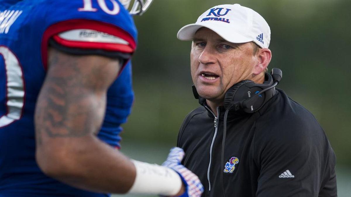 
The athletic director who hired Bill Snyder at Kansas State says David Beaty (right) in some ways has a harder job rebuilding the KU football program.
