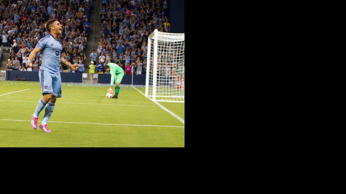 Dom Dwyer celebrates a goal against Toronto FC at Sporting Park in August. He scored his 19th goal of the season against Chivas USA on Friday to set the single-season record for Sporting KC. 
