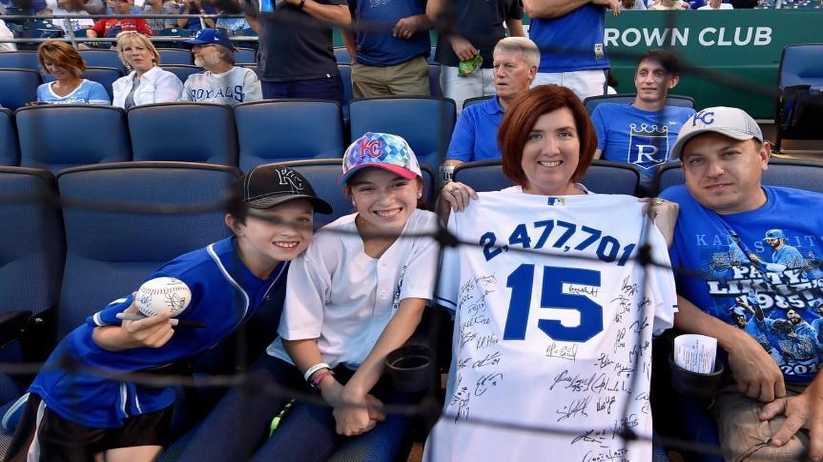 
Tony Tucker of Blue Springs (right) along with his wife, Heather, son Logan and daughter Paige were the fans who put the Royals over their attendance record.
