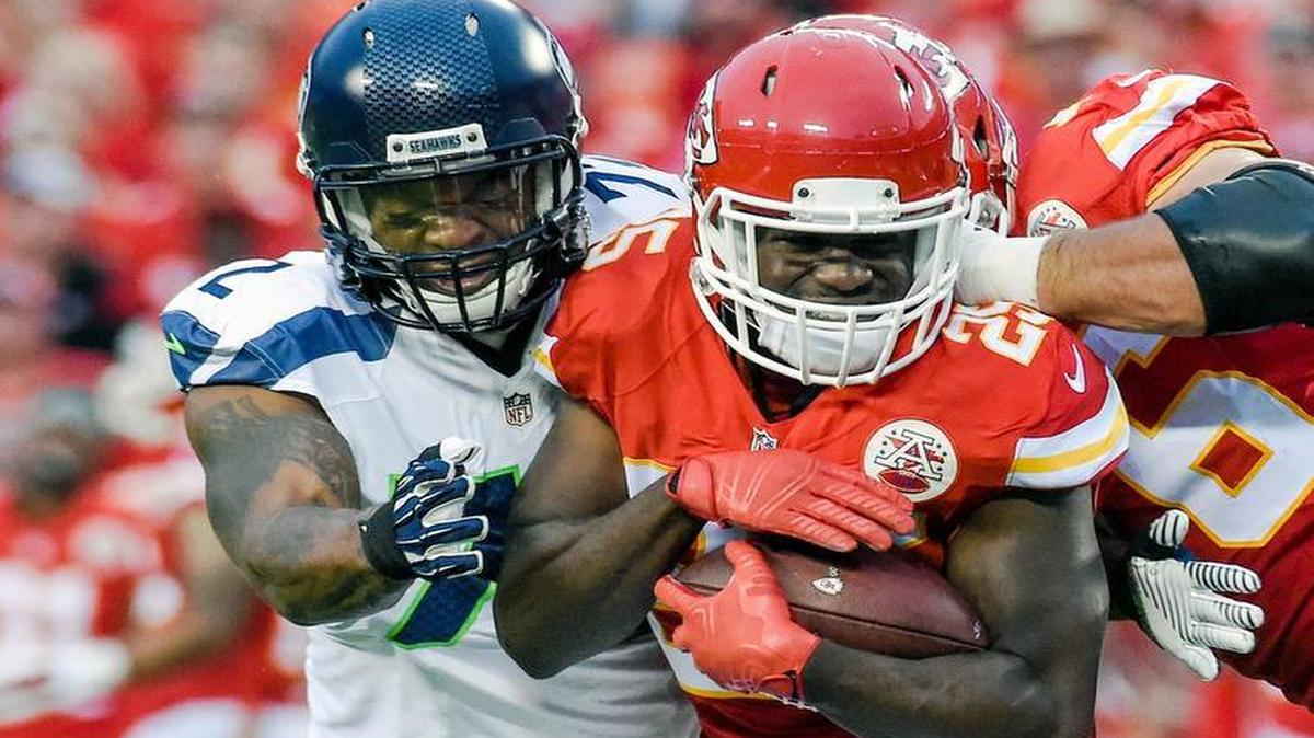 
Chiefs running back Jamaal Charles was tackled by Seahawks defensive end Michael Bennett during Friday's football game at Arrowhead Stadium.
