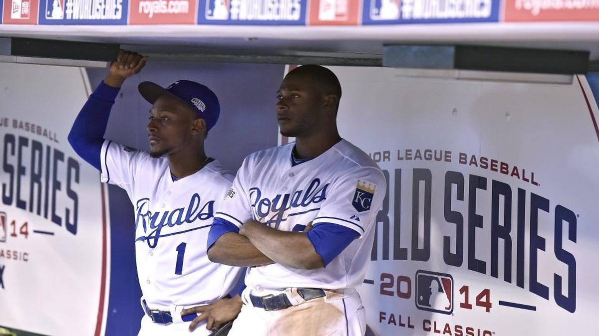 Kansas City Royals outfielders Jarrod Dyson and Lorenzo Cain watched as the San Francisco Giants celebrated following their Game 7 win in last year’s World Series.