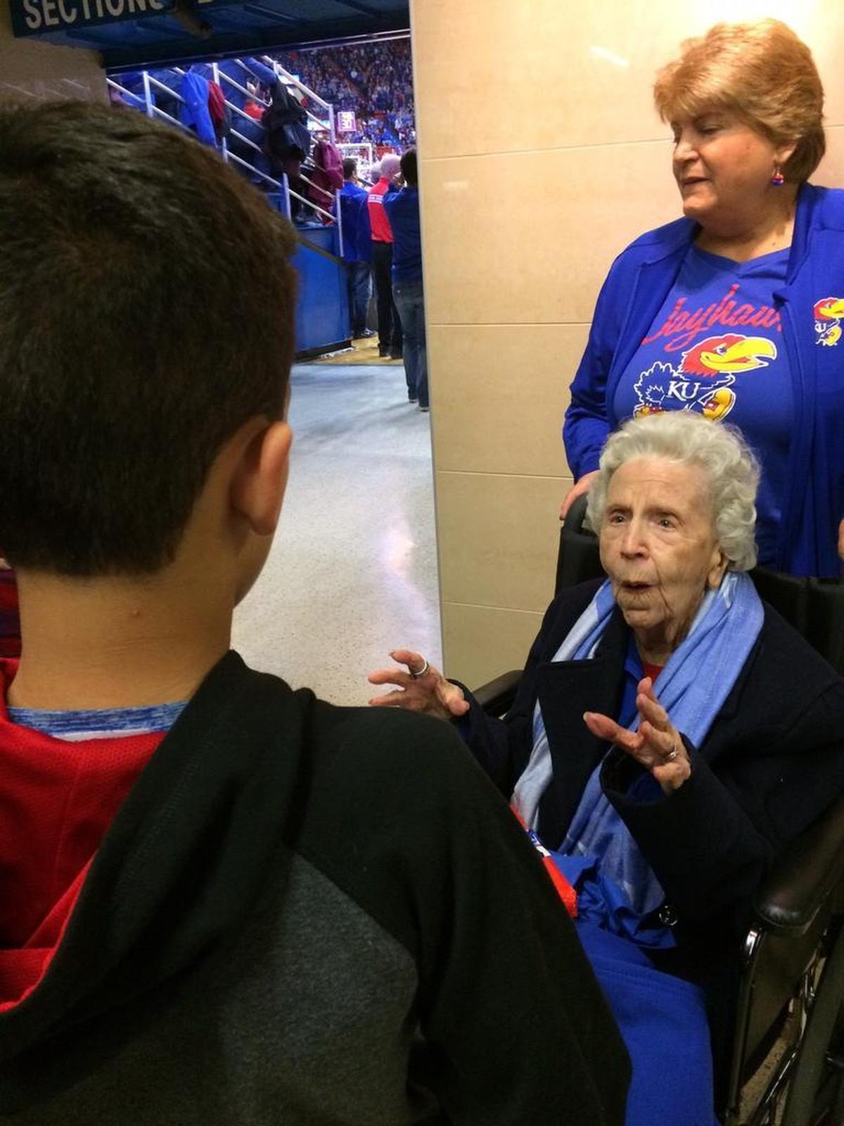 Ruby White, 101, was greeted during her first KU basketball game in Allen Fieldhouse on Tuesday night.