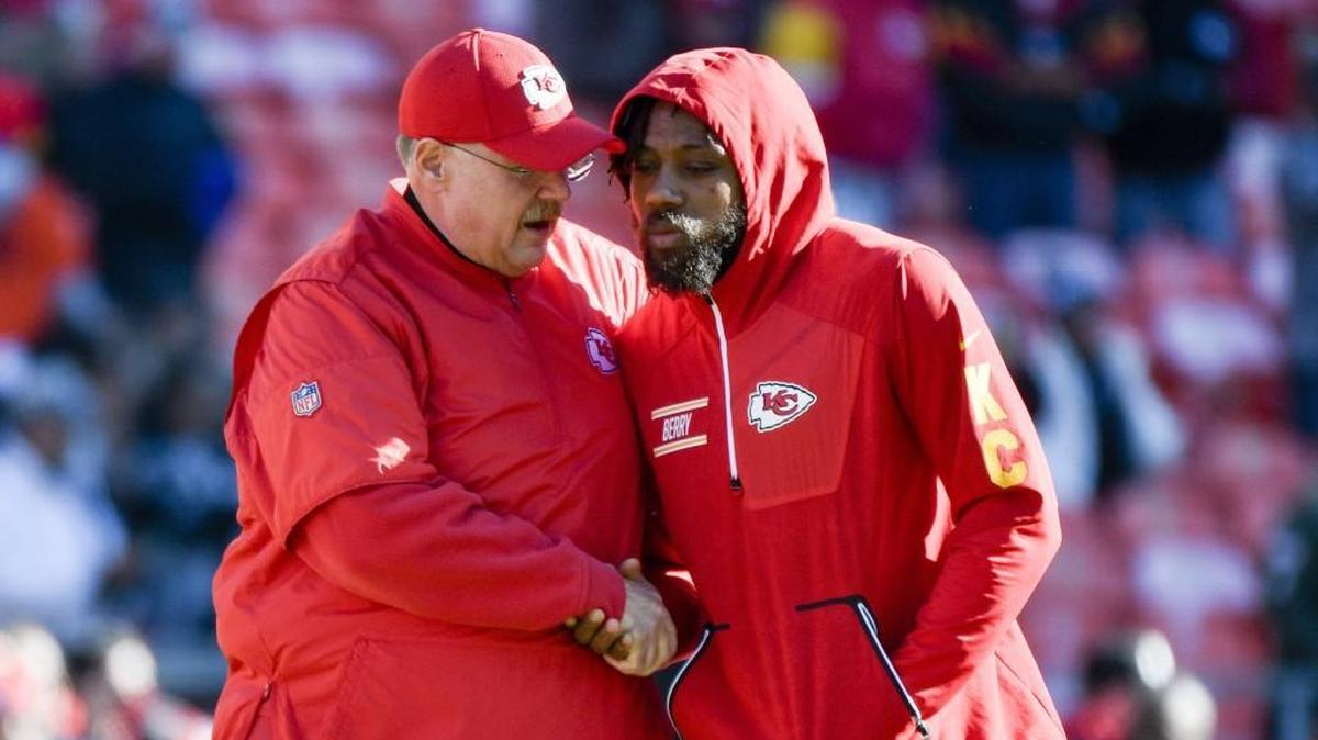 Chiefs coach Andy Reid, left, greets injured safety Eric Berry before a game against the Raiders at Arrowhead Stadium. Berry was on the sidelines for the game, showing up on the telecast with Reid and his assistants as they discussed strategy during the win.