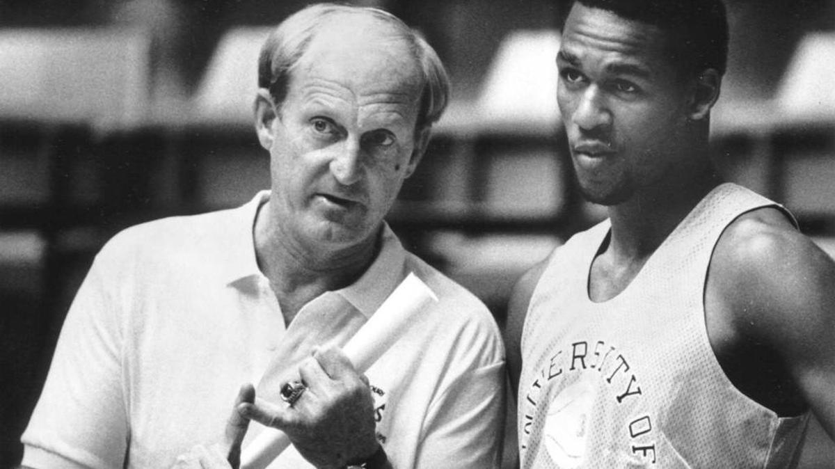 Stewart talks strategy with MU forward Derrick Chievous in 1987.