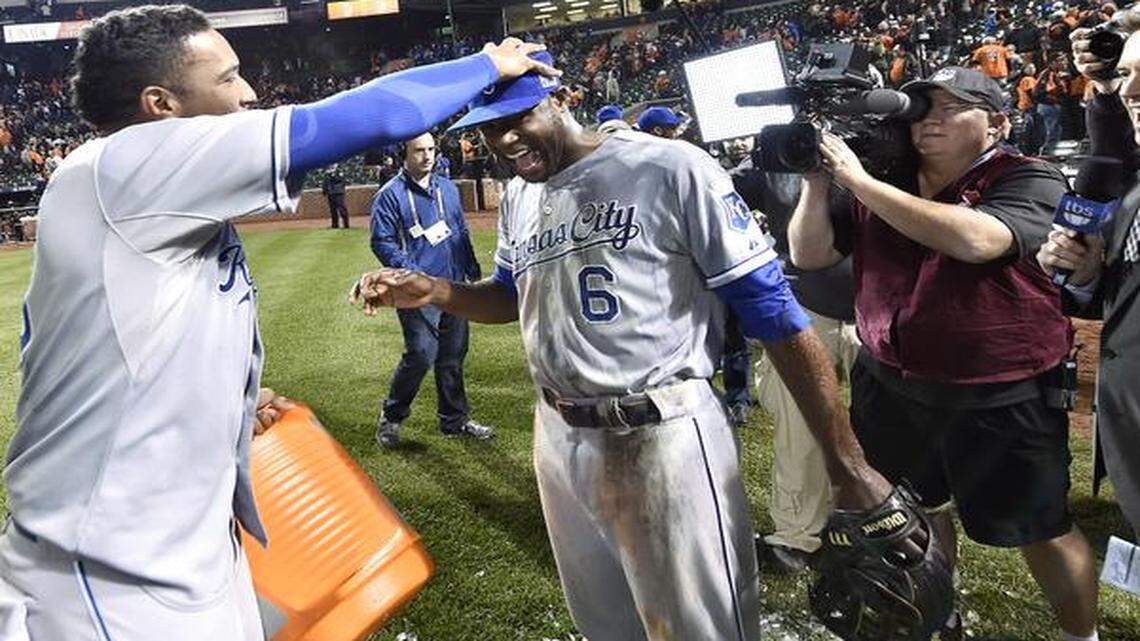 
Kansas City Royals' Salvador Perez (13) and Lorenzo Cain (6) celebrate the teams 6-4 win over the Baltimore Orioles during Saturday's ALCS baseball game on October 11, 2014 at Camden Yards in Baltimore, Md.
