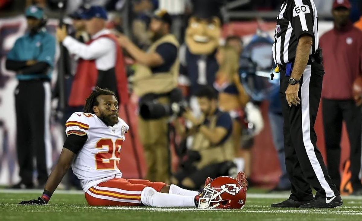Berry sits on the field after rupturing his Achilles Thursday night during the Chiefs’ win against the New England Patriots.