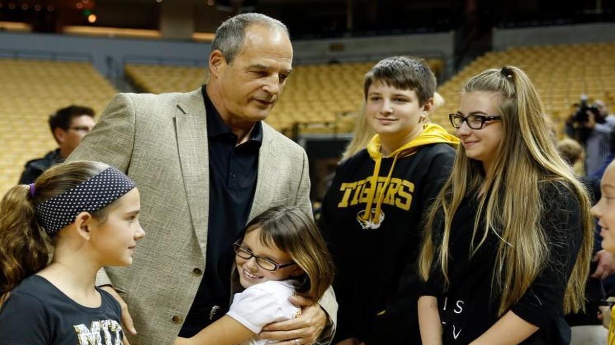 Missouri football coach Gary Pinkel was surrounded by family following a news conference Friday in Columbia.