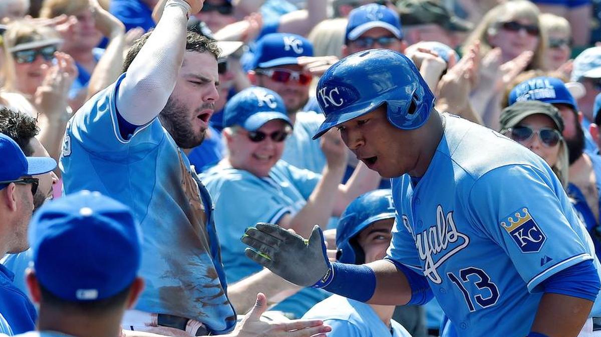 
The Royals’ Salvador Perez received congratulations from Mike Moustakas (center) and other teammates after Perez hit a solo homer in the eighth inning that proved to be the winning run in a 4-3 victory over the Texas Rangers on Sunday at Kauffman Stadium.
