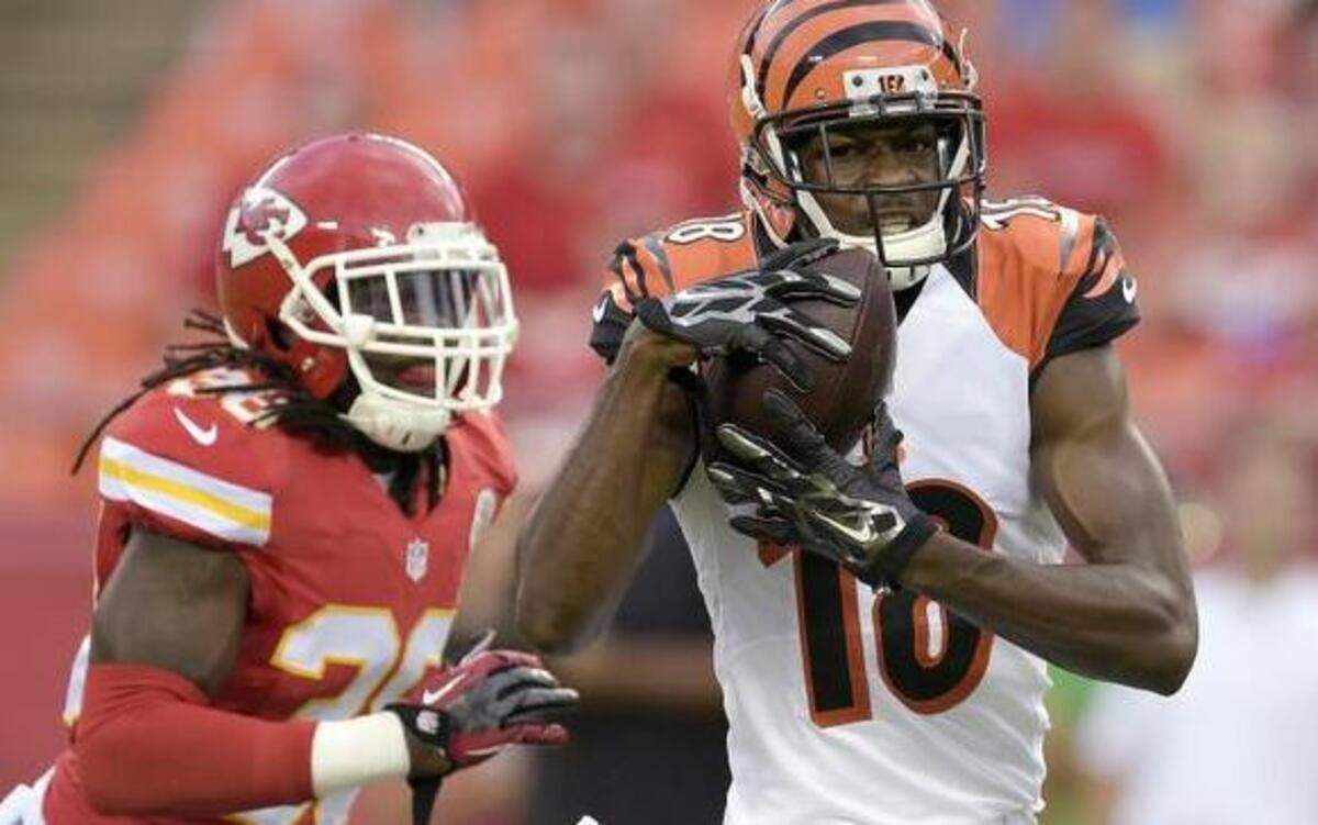 
Cincinnati Bengals wide receiver A.J. Green (18) hauled in a first-down pass in front of Kansas City Chiefs cornerback Ron Parker (38) in the first quarter of Thursday’s preseason football game at Arrowhead Stadium in Kansas City, Mo.
