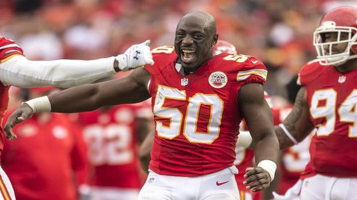 
Chiefs outside linebacker Justin Houston (50) celebrated the half-sack of teammate Dee Ford (55) in the fourth quarter against the Oakland Raiders on December 14, 2014, at Arrowhead Stadium. The Chiefs won 31-13.
