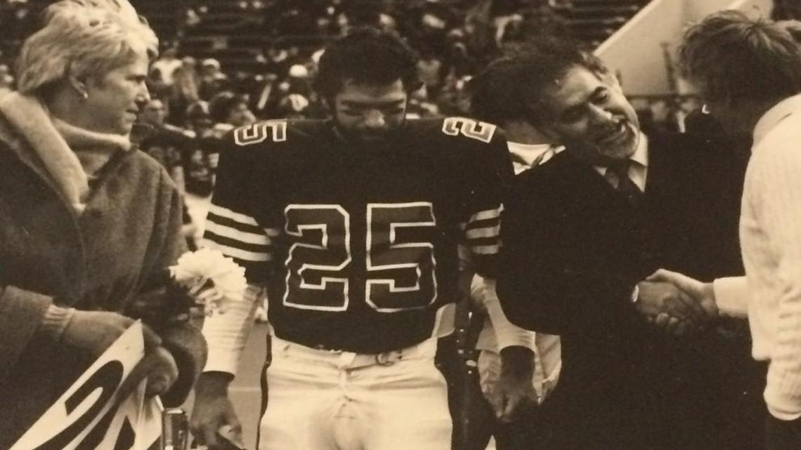 Vahe Gregorian with parents and Coach Jerry Berndt at senior day against Harvard.