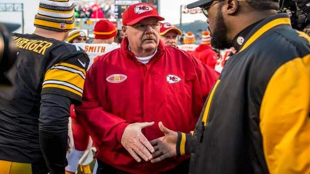 
Chiefs coach Andy Reid, center, shakes hands with Mike Tomlin, his Pittsburgh counterpart, after Sunday’s loss to the Steelers.
