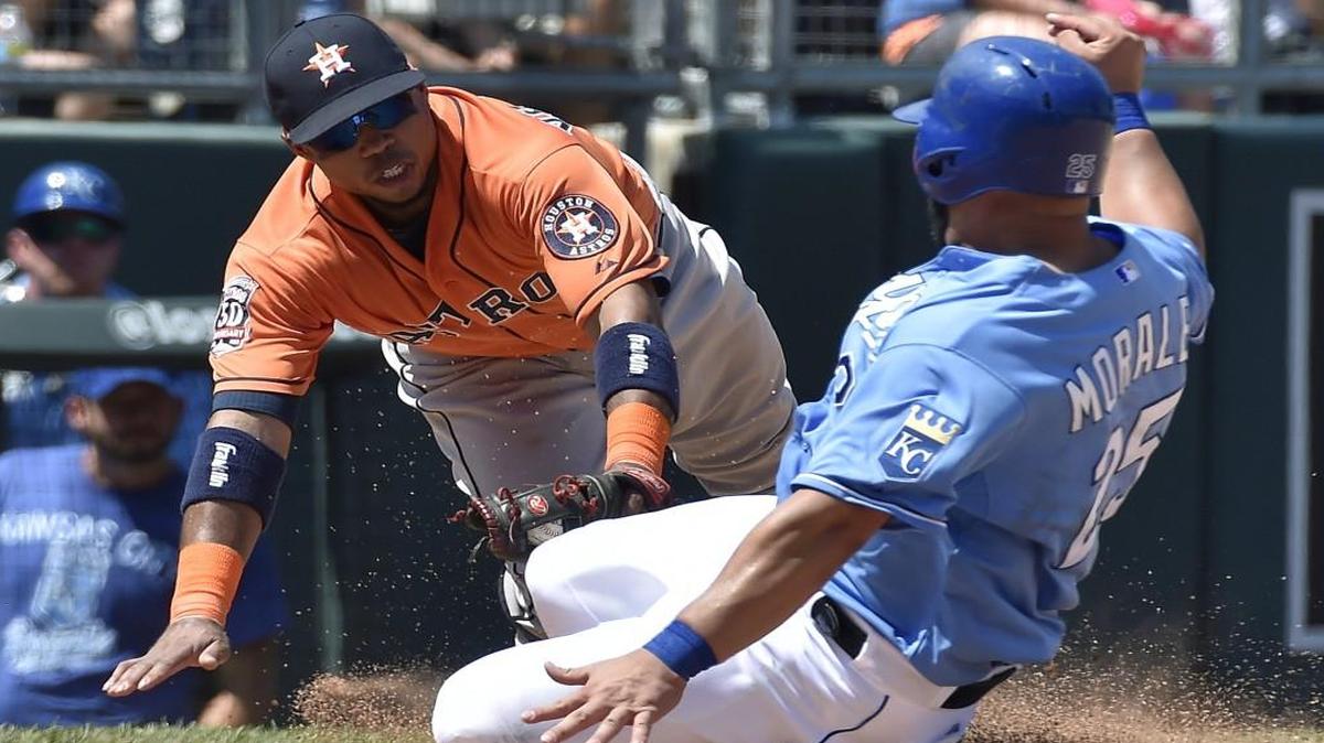 
The Royals’ Kendrys Morales was tagged out trying to reach third by Houston Astros third baseman Luis Valbuena during a game in July
