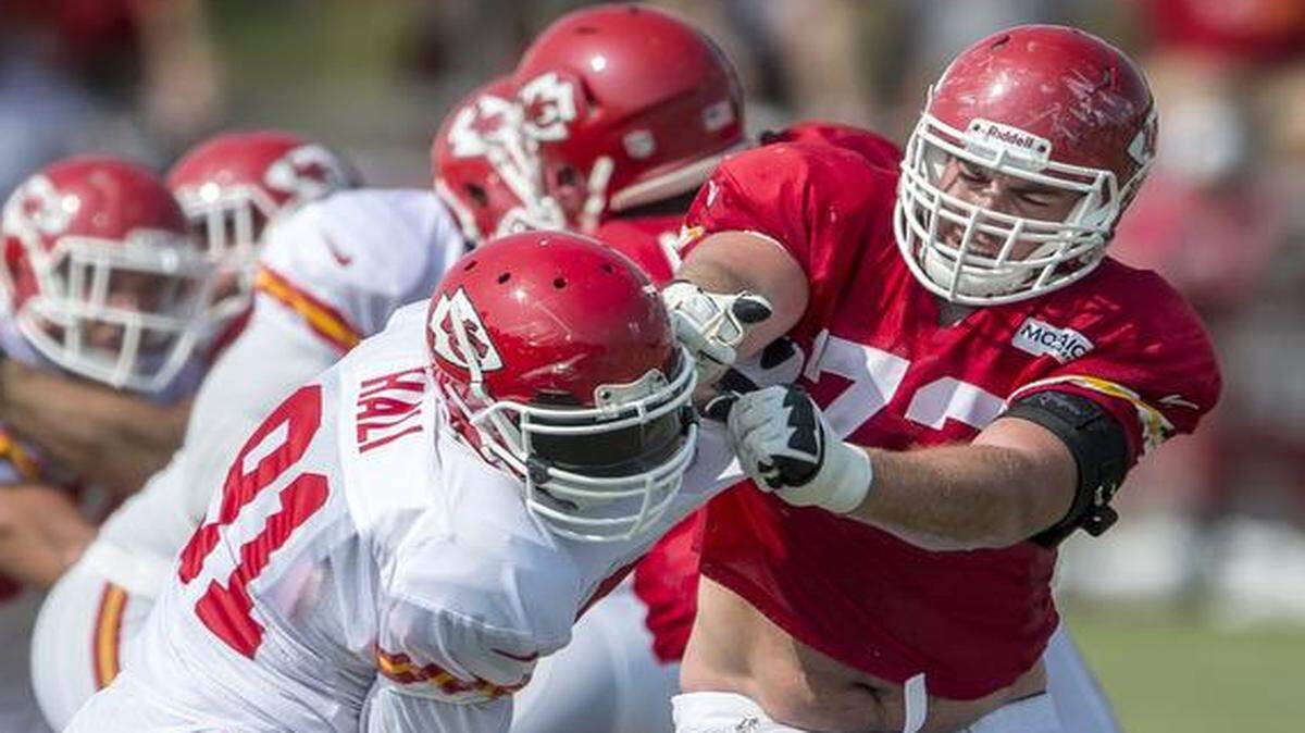
Last year’s injuries and a much-scrutinized rookie season behind him, Chiefs left tackle Eric Fisher, right, is hoping to make a major impact this season.
