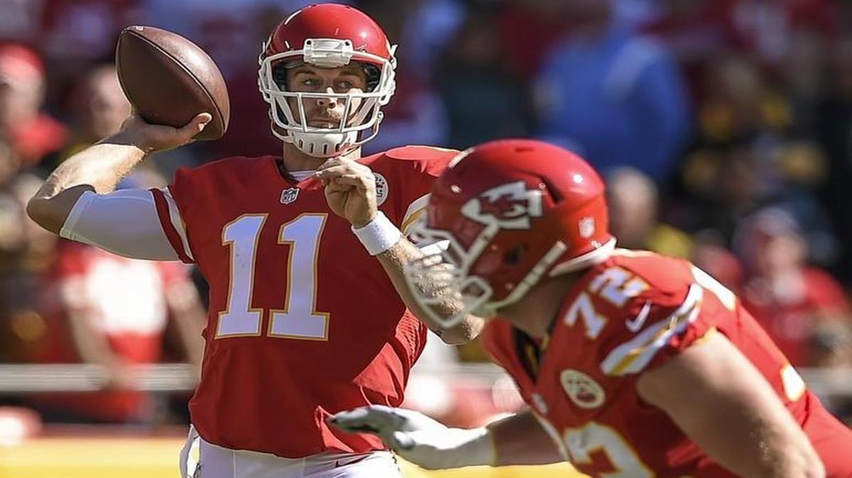 Throwing away from defenders as much as to his receivers has helped craft a remarkable string of pass attempts without an interception for Chiefs quarterback Alex Smith.