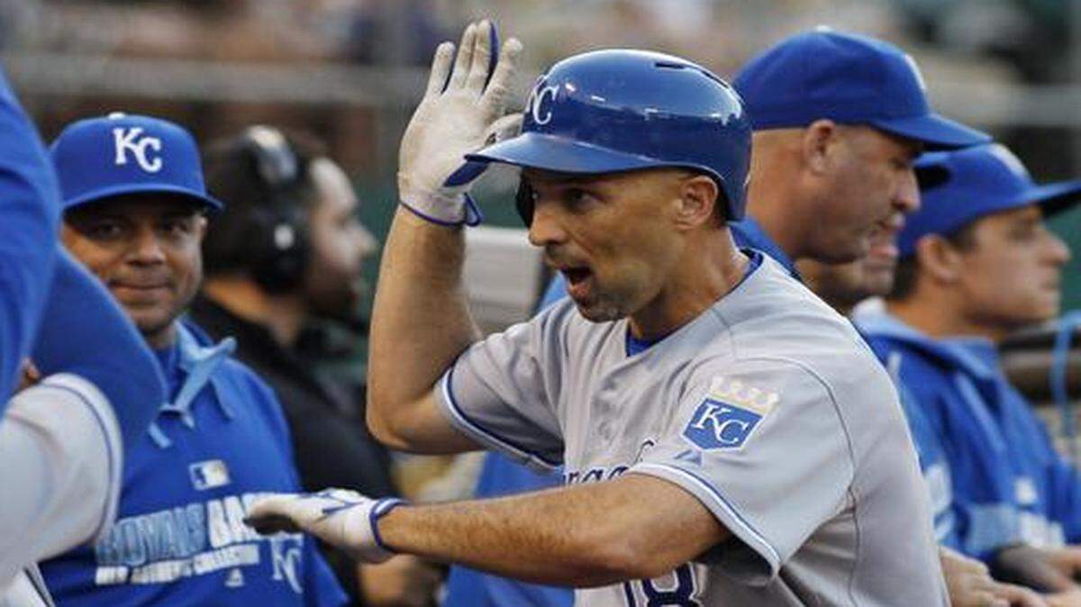 
The Kansas City Royals’ Raul Ibanez was warmly greeted in the dugout after hitting a home run against the Oakland Athletics during the fifth inning on Aug. 1 in Oakland, Calif. 
