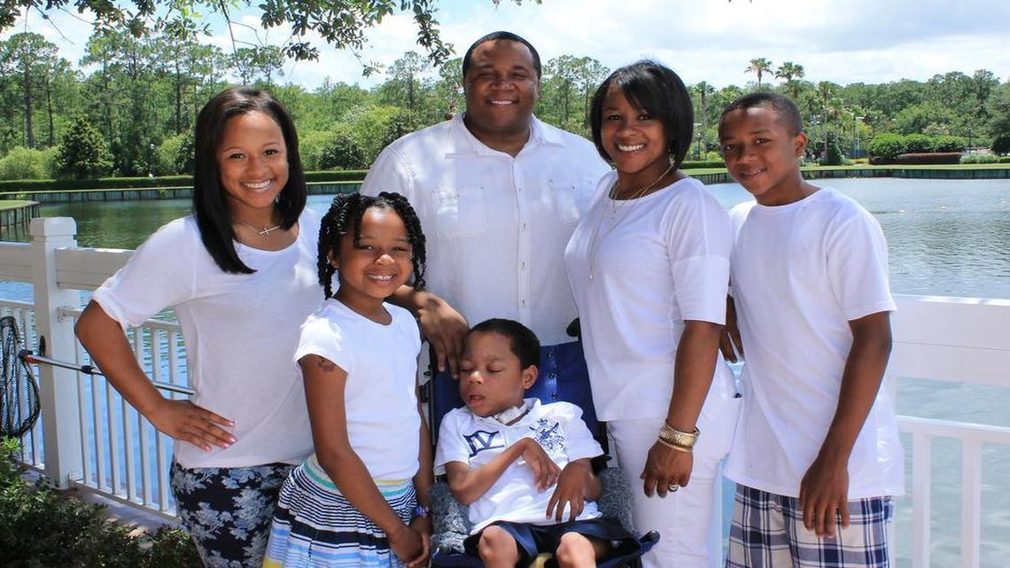 The Lowery family (from left): Lexis, Jazmyn, Kahari (center), Chris, Erika and C.J.