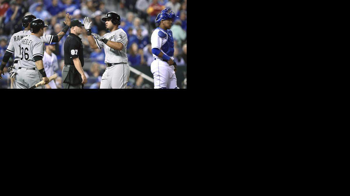 
Chicago White Sox's Alexei Ramirez (left to right), Josh Phegley and Jose Abreu celebrate all scoring on a triple by Conor Gillaspie in the seventh inning.
