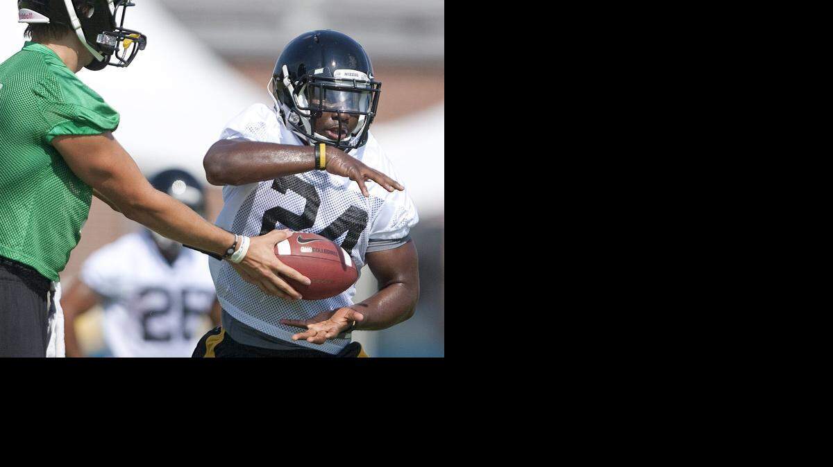 
 Derrick Washington (right) was accused of sexual assault while he was at Missouri.


