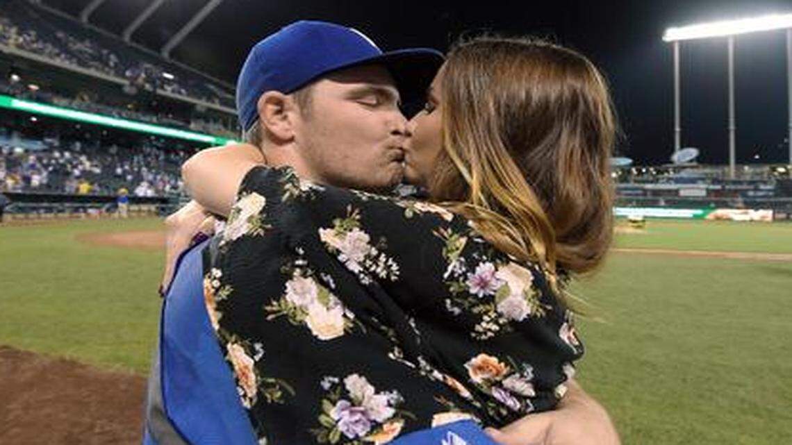 
Royals starter Liam Hendriks got a kiss from his wife, Kristi, after a 6-1 victory over the Twins on Wednesday.


 
