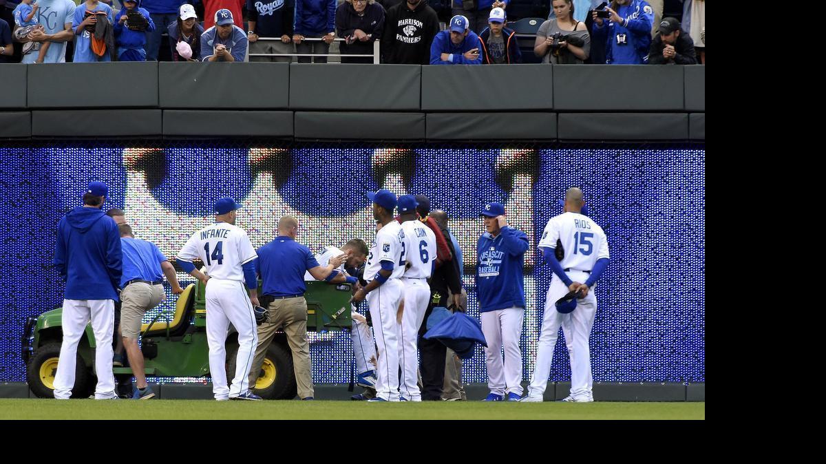 
Kansas City Royals left fielder Alex Gordon (4) is taken off the field on a cart after being injured chasing a in the park home run by Tampa Bay Rays second baseman Logan Forsythe in the fourth inning during Wednesday's baseball game on July 8, 2015 at Kauffman Stadium in Kansas City, Mo.
