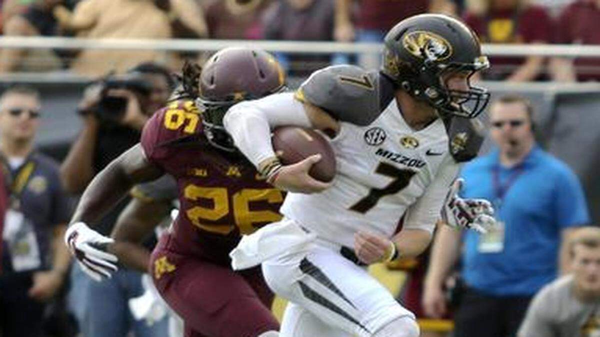 
Missouri quarterback Maty Mauk ran for a touchdown in the second half against Minnesota on Thursday.
