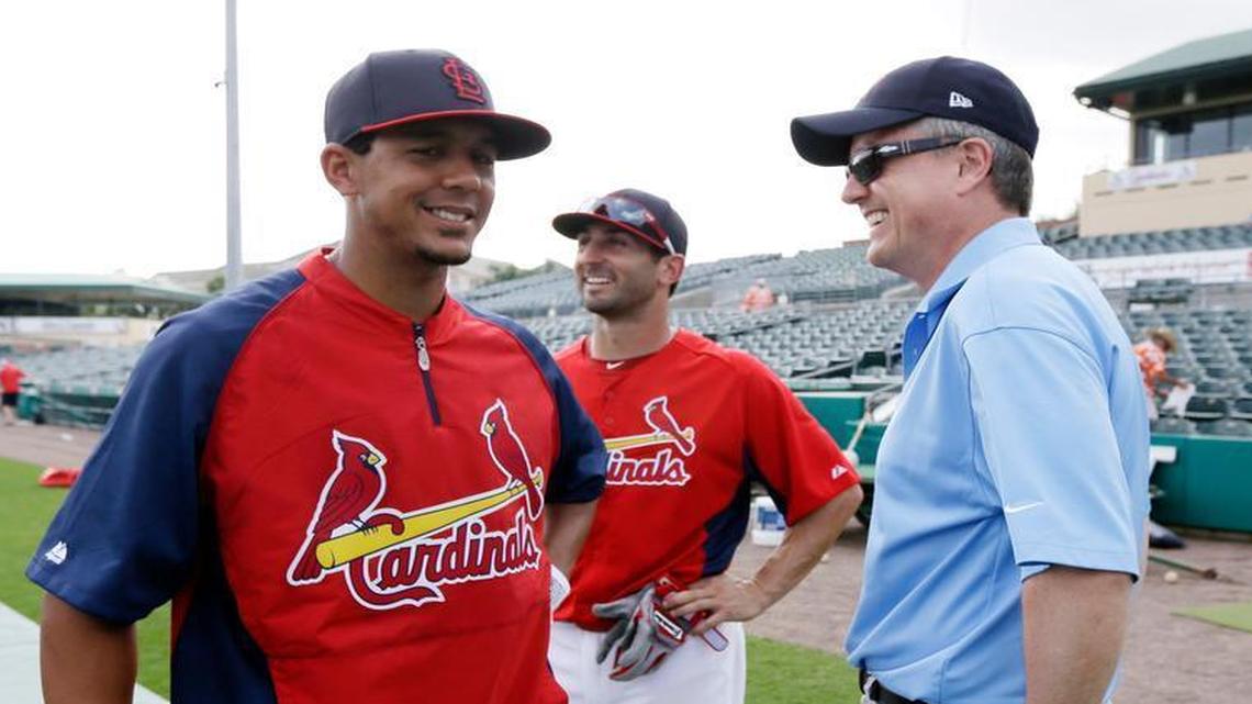 
Houston Astros general manager Jeff Luhnow (right) talked with members of his former team before a spring training game in 2013 in Jupiter, Fla.

