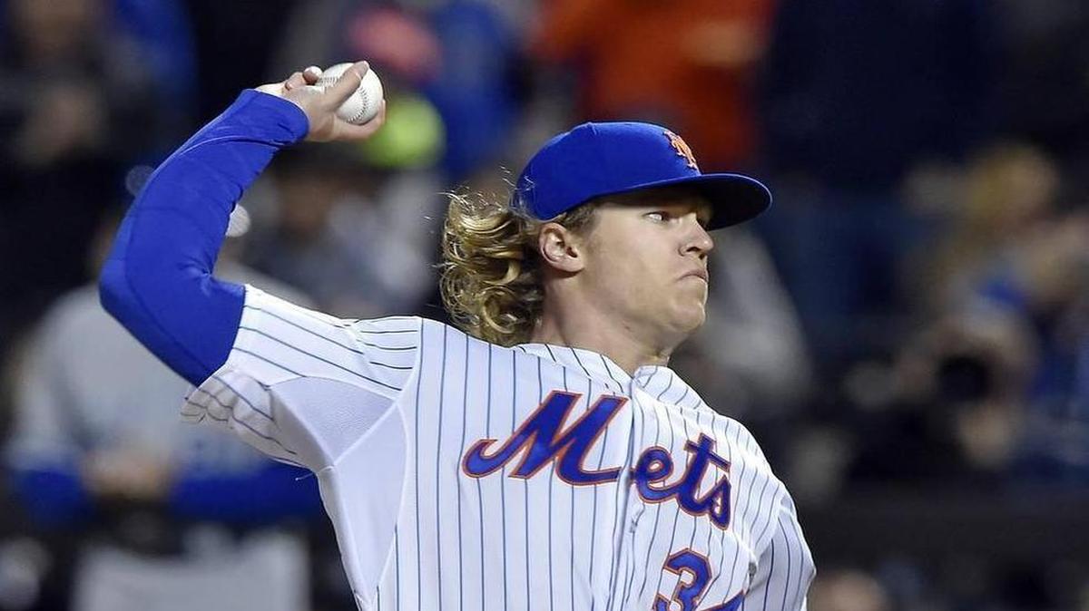 New York Mets starting pitcher Noah Syndergaard throws in the first inning during game three of the World Series on Friday, October 30, 2015 at Citi Field in New York.