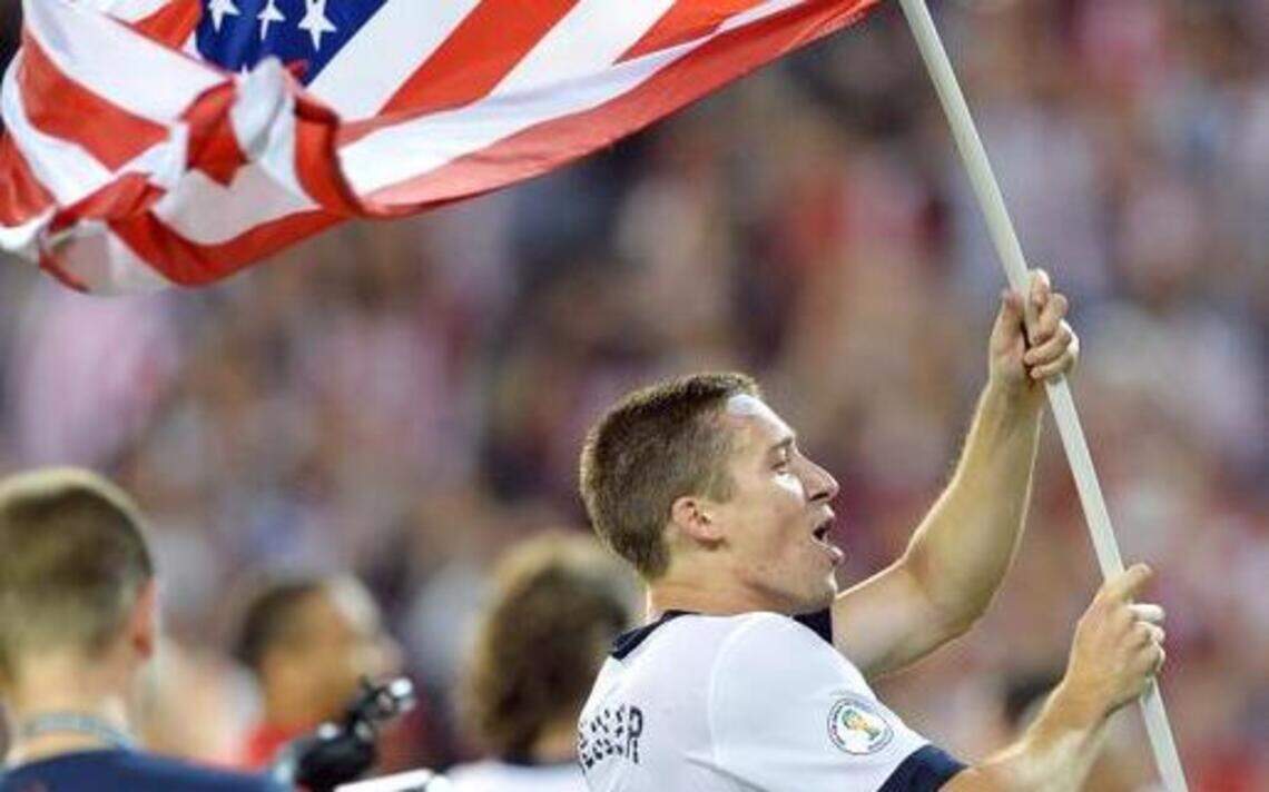 Matt Besler carries Kansas City’s soccer flag into Brazil for the World Cup