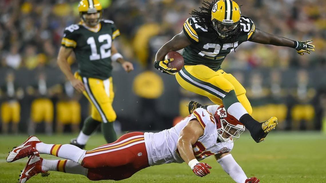 
Green Bay’s Eddie Lacy leaped over Chiefs inside linebacker Josh Mauga for some of the Packers’ 123 yards on the ground Monday night.
