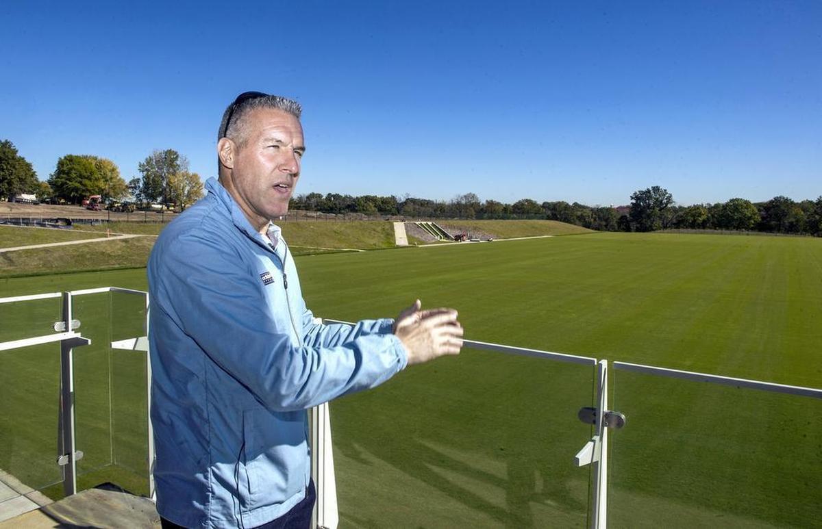 Sporting Kansas City coach Peter Vermes spoke near grass fields at the National Training and Coaching Development Center in Kansas City, Kan. The $80 million facility is expected to open in December.