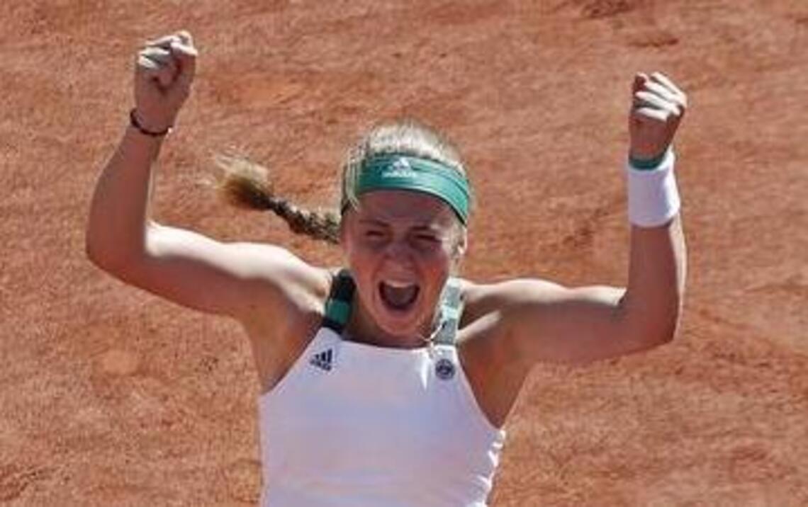 Unseeded Ostapenko tops Halep at French Open for first title