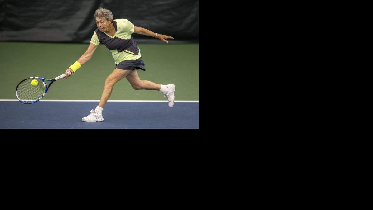 
Rita Price of Aurora, Colo., leaned in to return a forehand on Wednesday morning at the Midtown Athletic Club in Overland Park during the USTA National Women's 65, 75, 85 Indoor Championships. Price, seeded second, won her semifinal in the women's 85 singles division, 6-3, 7-5.
