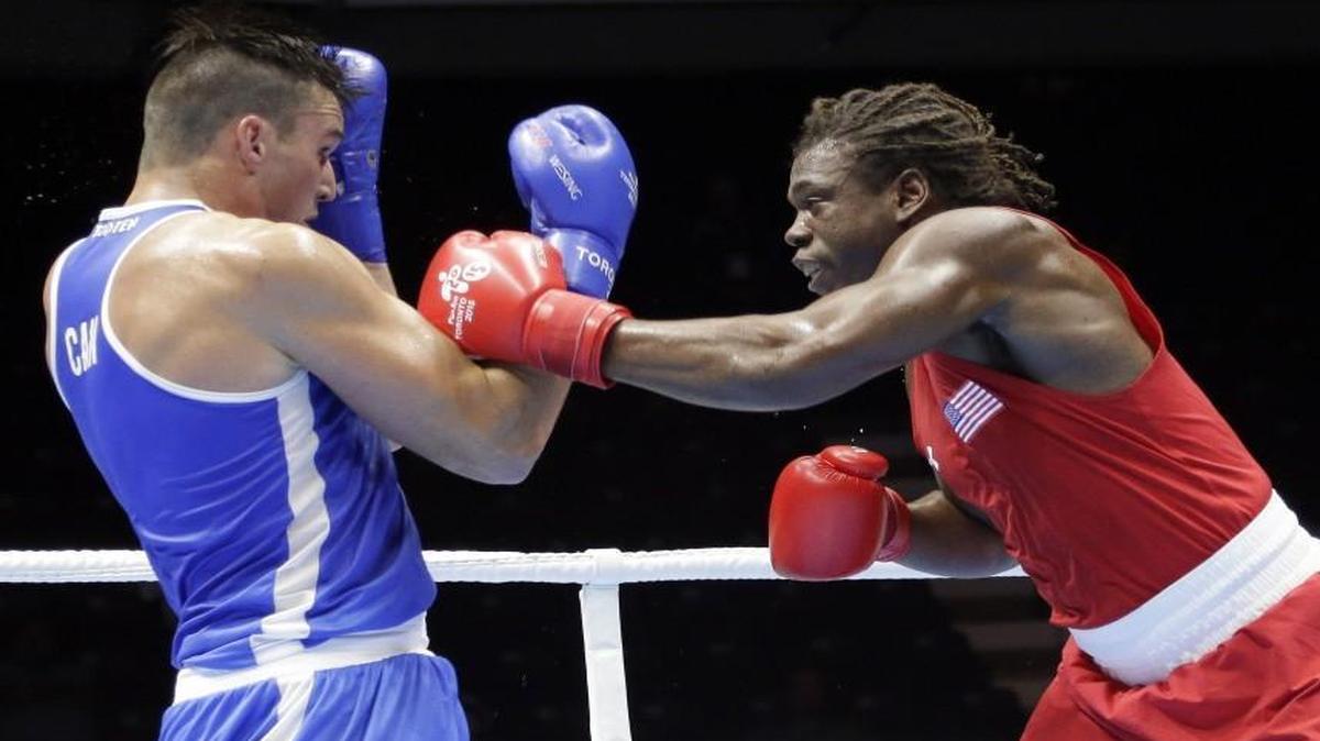 Cam Awesome (right) fought at the Pan Am Games in July in Oshawa, Ontario.